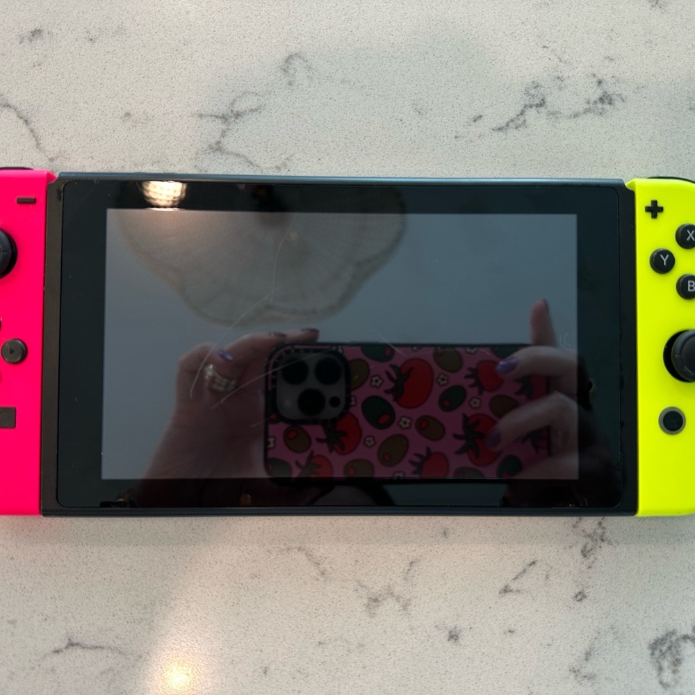 Nintendo Switch Console with Neon Red/Neon Blue Joy-Con Controller